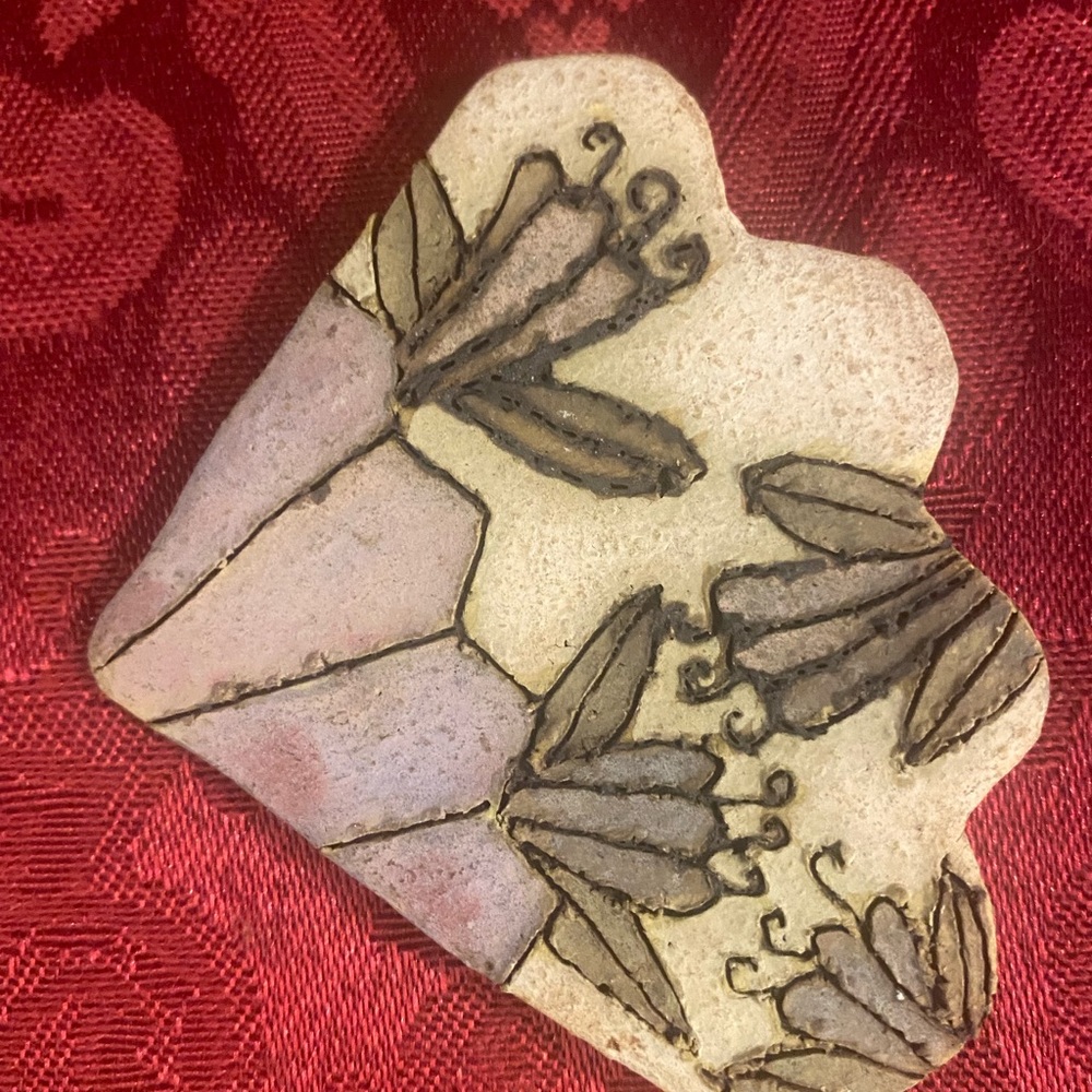 Signed ceramic pin by Sabra Segal